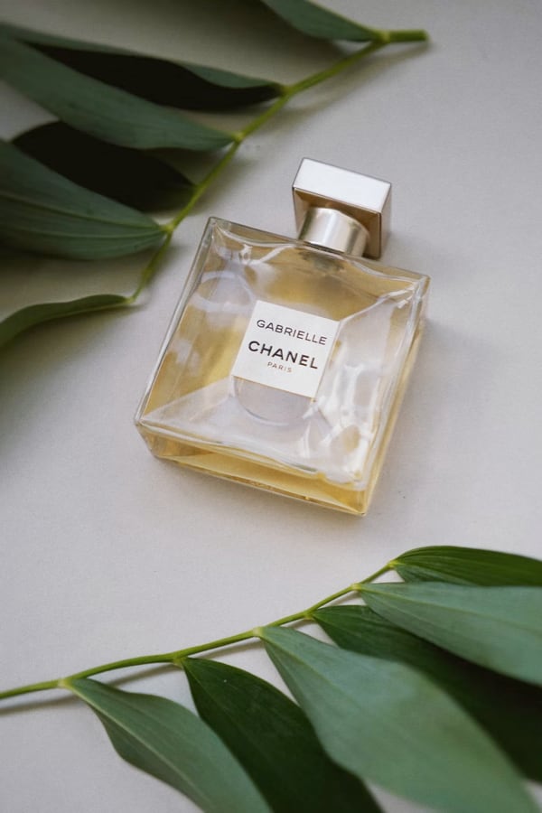 square bottle of perfume that says 'gabrielle chanel paris'